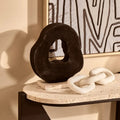 Black Mango Wood Sculpture on Travertine Base