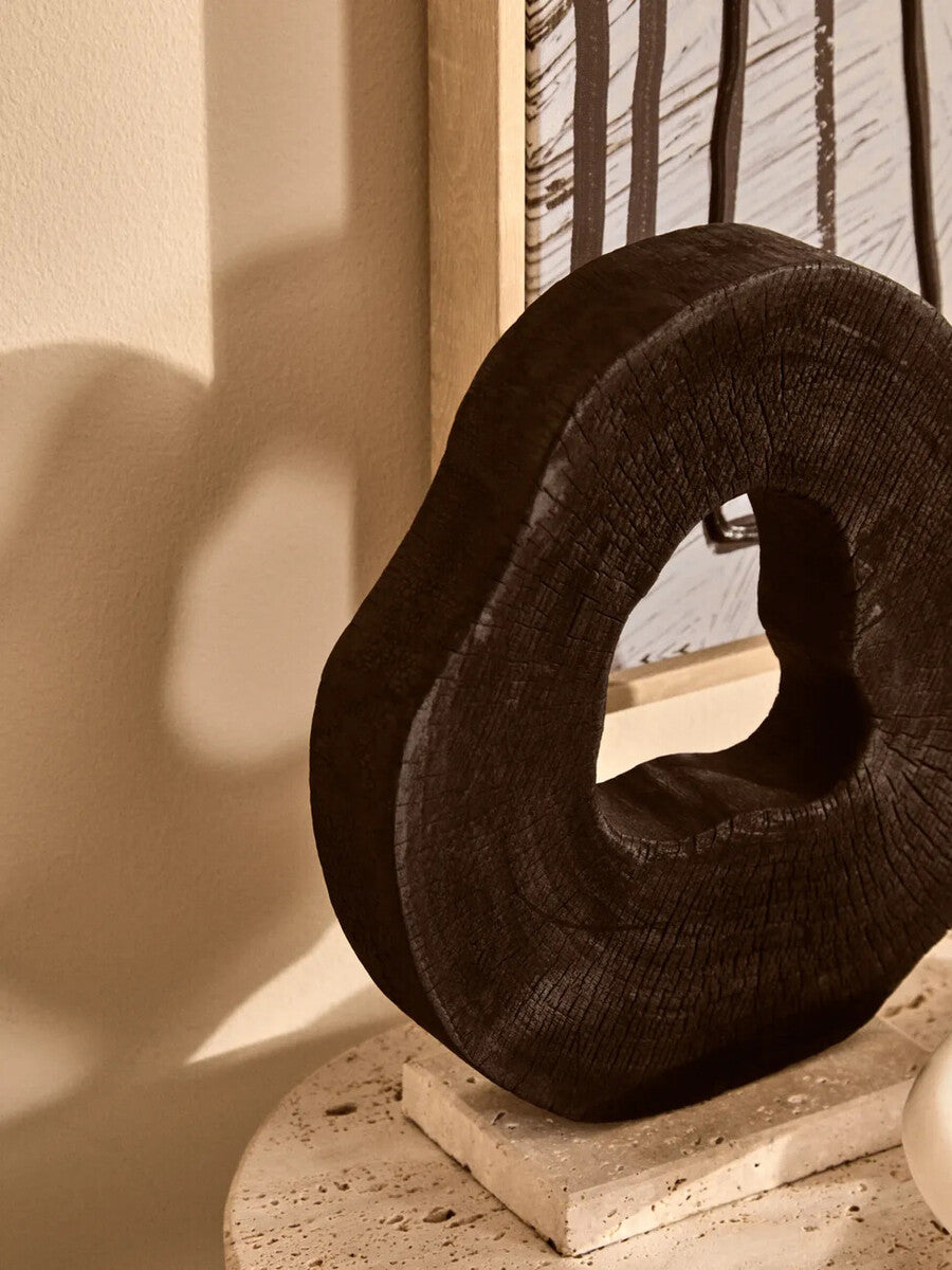 Black Mango Wood Sculpture on Travertine Base